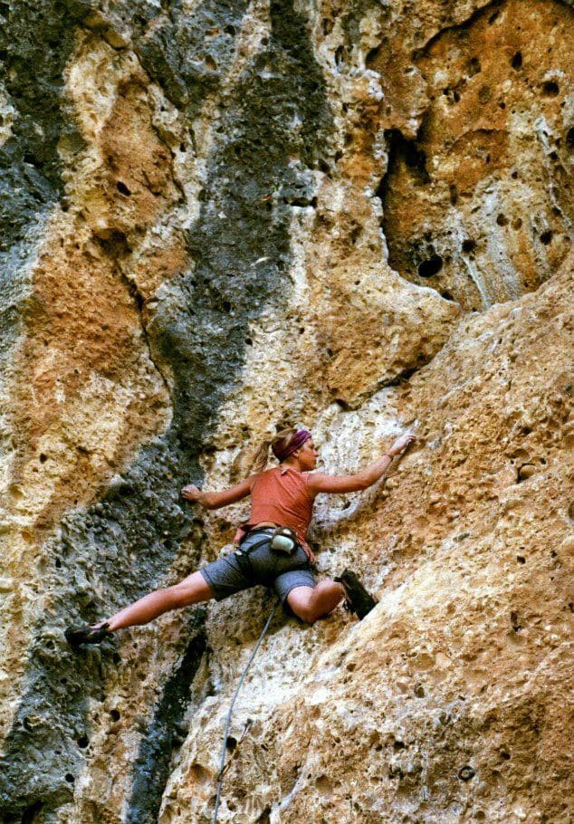 Rock climbing up a cliff